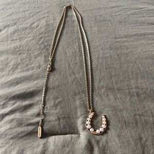 Stella & Dot Brass colored Necklace with White pearlesque Horseshoe Pendant